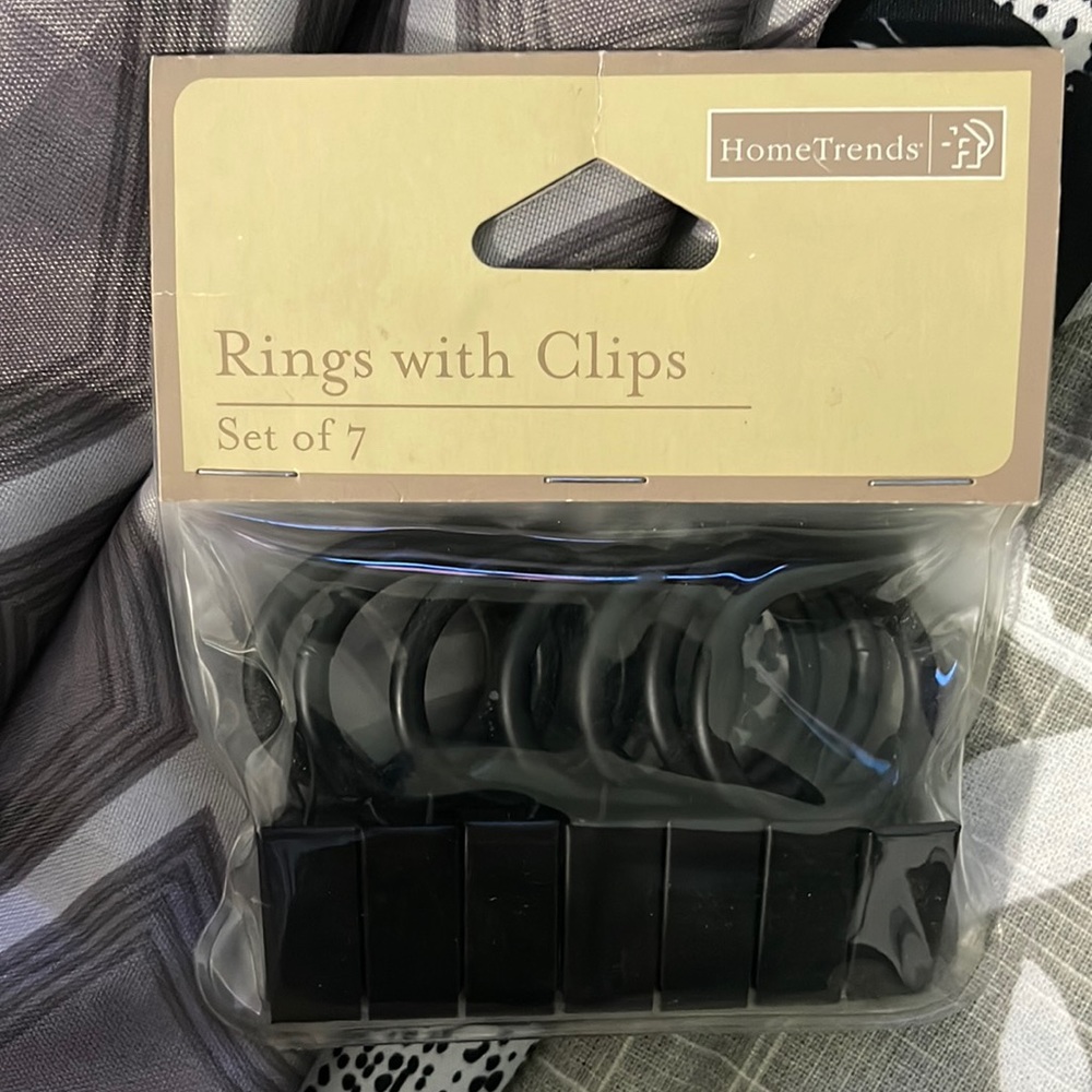 New and never used Shower curtain rings with clips! Set of 7